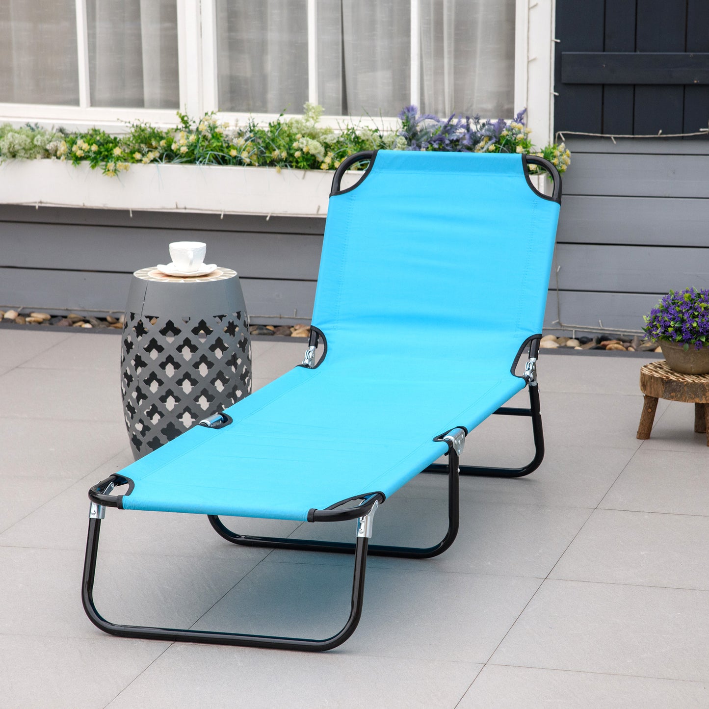 Blue Steel Outdoor Lounge Chair for Poolside Relaxation and Patio Use
