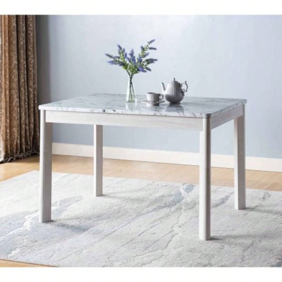 Faux marble white dining table top Four rounded leg posts Rounded table corners White Oak leg color
