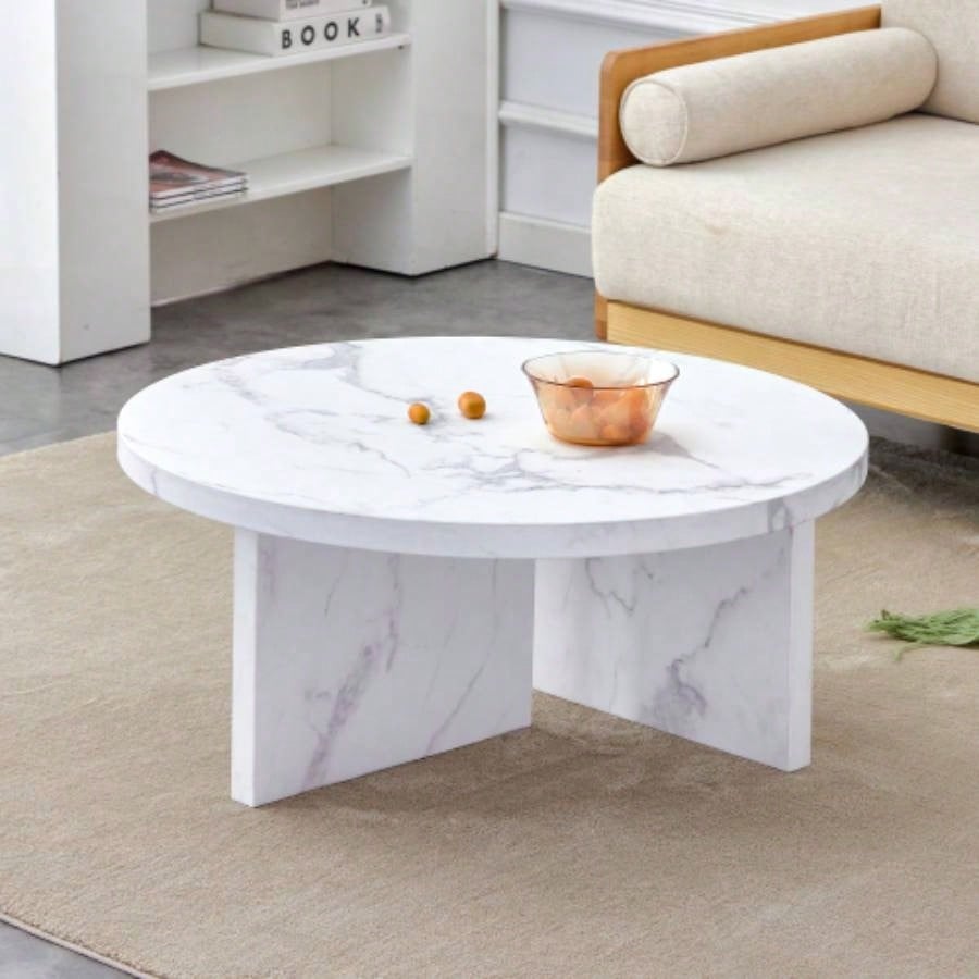 A white MDF material circular patterned coffee table, a 31.4 - inch white center table, modern coffee table, suitable small spaces and living rooms.