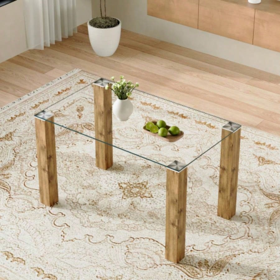 A 49.6 * 30 Inch Transparent Tempered Glass Dining Table With Rectangular Walnut Color MDF Wood Grain, Combining Simplicity And Quality. Can Easily Blend Into Various Decoration Styles.