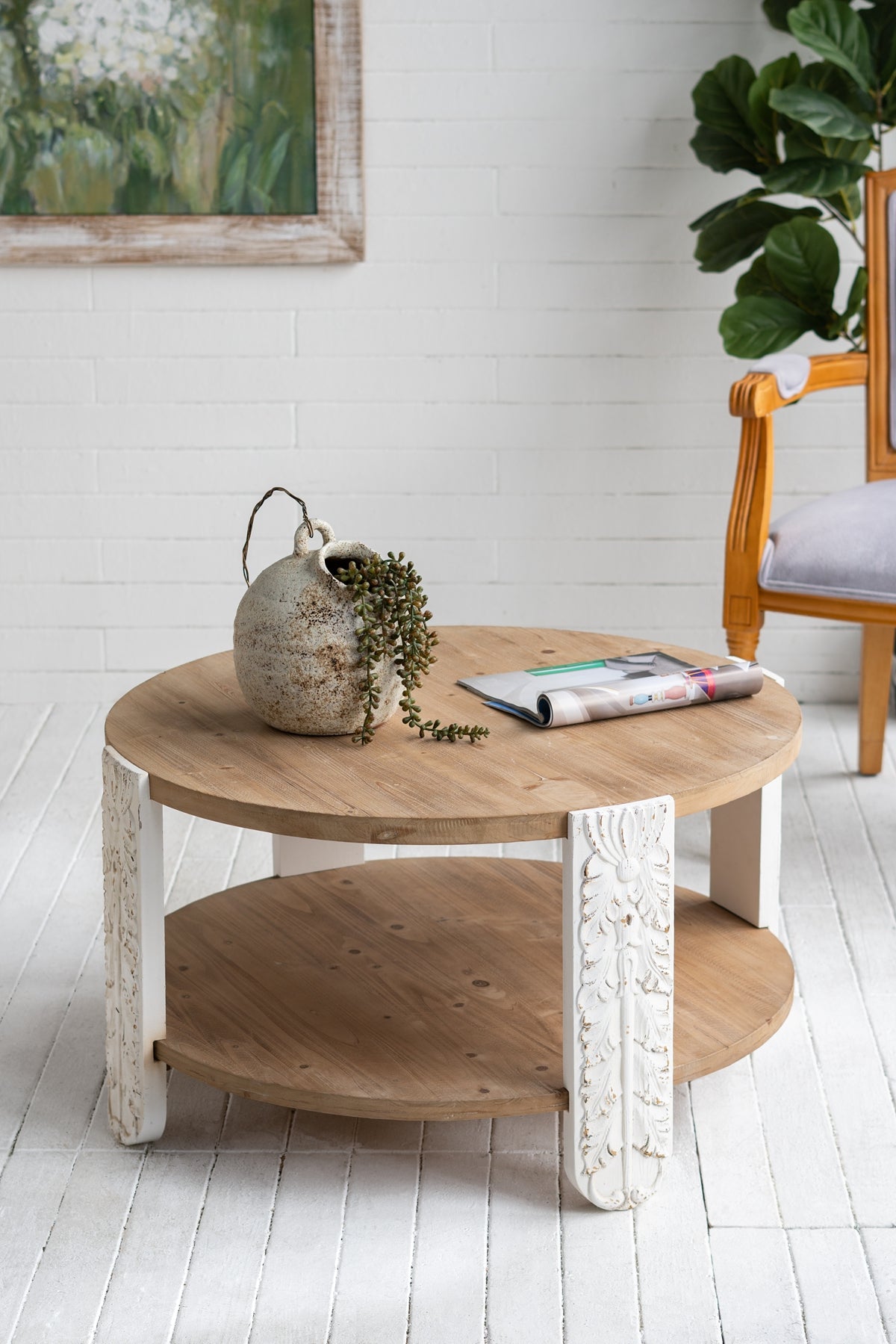 31.5x31.5x17.7" Round Wooden Coffee Table with Natural Brown Finish, Carved White Legs, and Lower Storage Shelf
