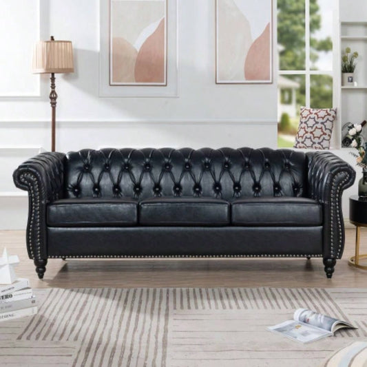 84.65 BLACK PU Rolled Arm Chesterfield Three Seater Sofa.
