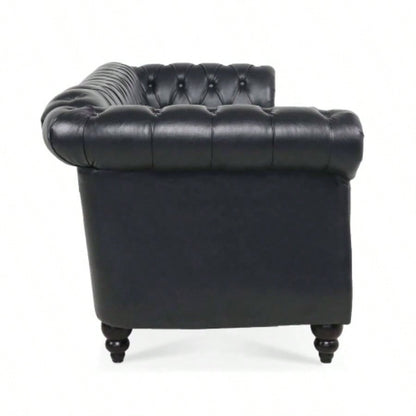 84.65 BLACK PU Rolled Arm Chesterfield Three Seater Sofa.