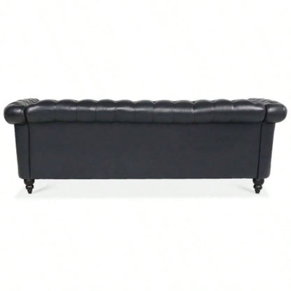 84.65 BLACK PU Rolled Arm Chesterfield Three Seater Sofa.