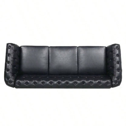 84.65 BLACK PU Rolled Arm Chesterfield Three Seater Sofa.