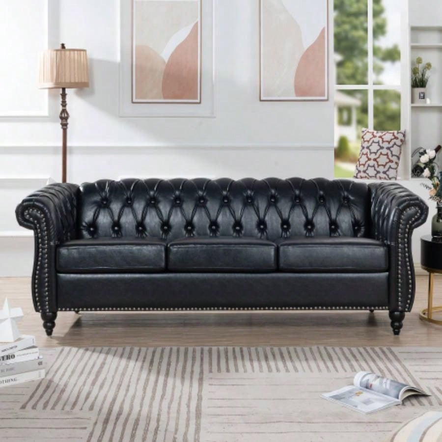 84.65 BLACK PU Rolled Arm Chesterfield Three Seater Sofa.