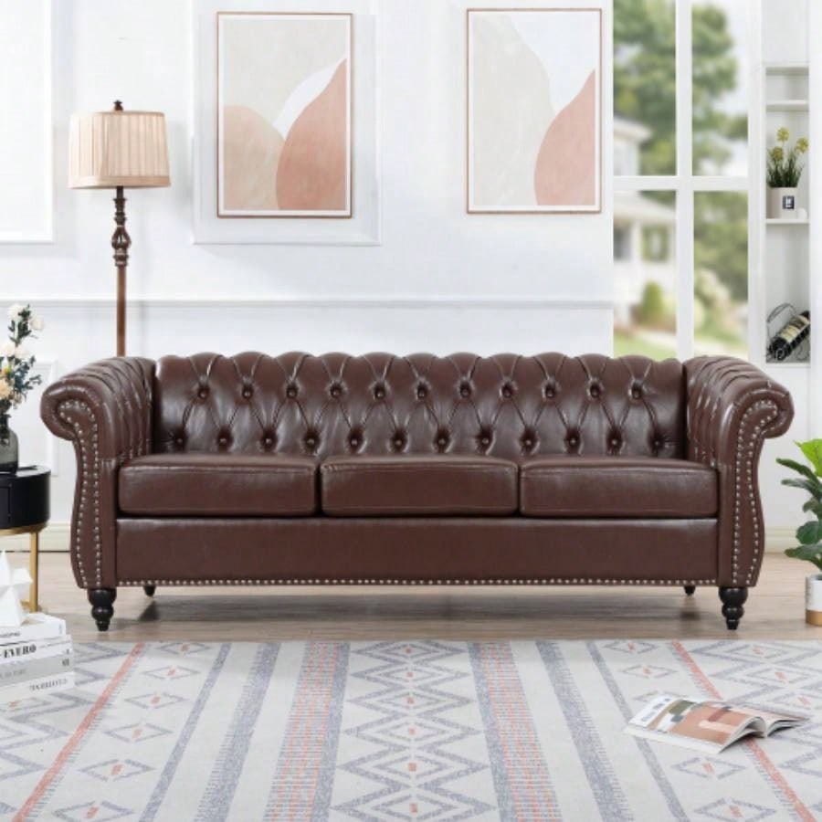 84.65 BLACK PU Rolled Arm Chesterfield Three Seater Sofa.