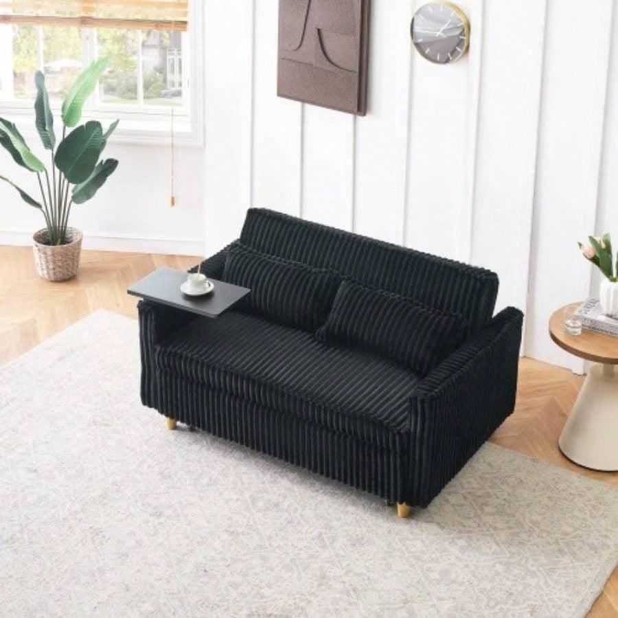 pull - out and push - in black corduroy sofa with dual functions, equipped with a movable tabletop and USB ports, is suitable use in living rooms and bedrooms.