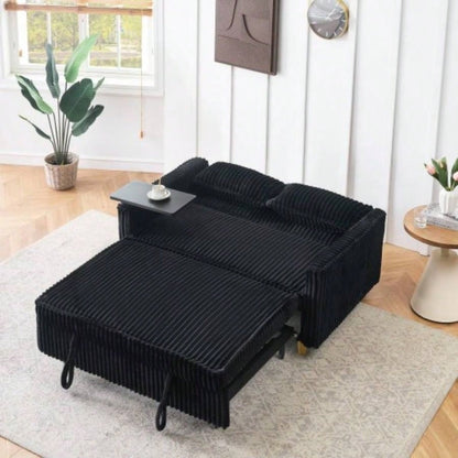 pull - out and push - in black corduroy sofa with dual functions, equipped with a movable tabletop and USB ports, is suitable use in living rooms and bedrooms.