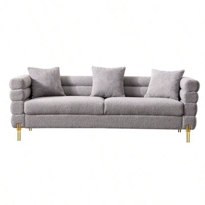 Luxurious and comfortable upholstered sofa with golden and pillows living room and reception area