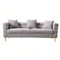 Luxurious and comfortable upholstered sofa with golden and pillows living room and reception area
