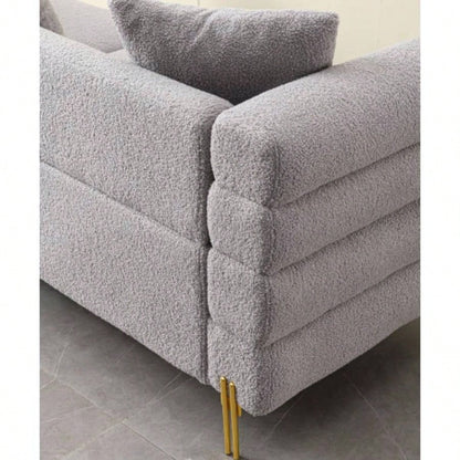 Luxurious and comfortable upholstered sofa with golden and pillows living room and reception area