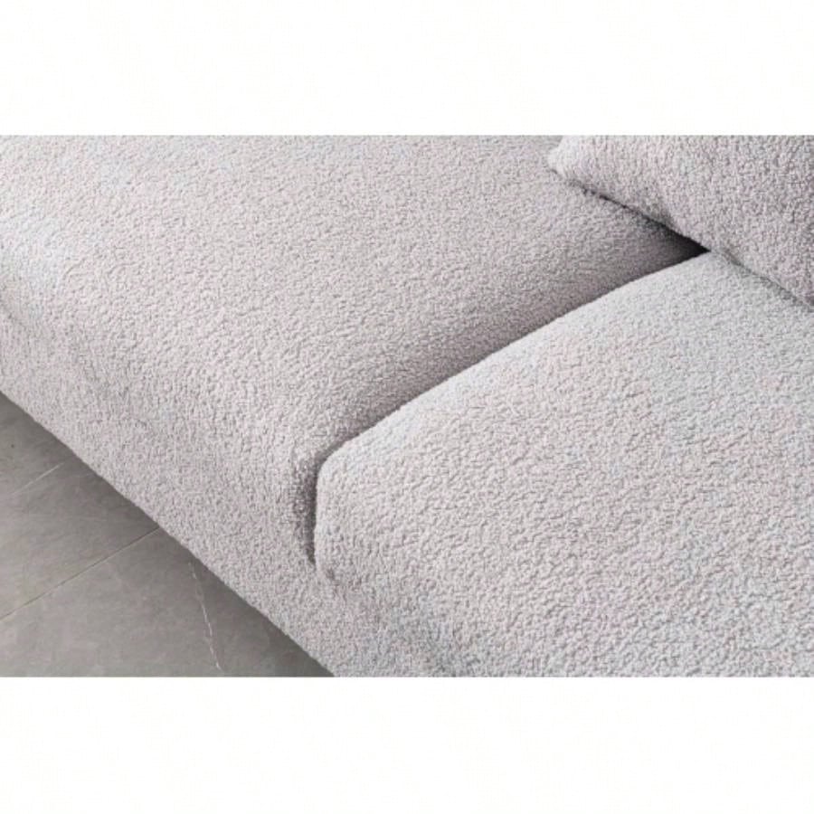 Luxurious and comfortable upholstered sofa with golden and pillows living room and reception area
