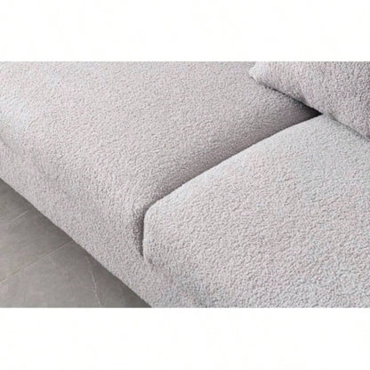 Luxurious and comfortable upholstered sofa with golden and pillows living room and reception area