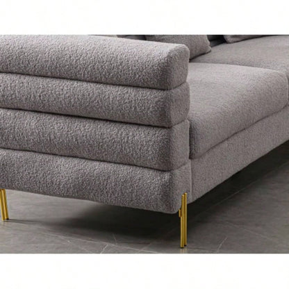 Luxurious and comfortable upholstered sofa with golden and pillows living room and reception area