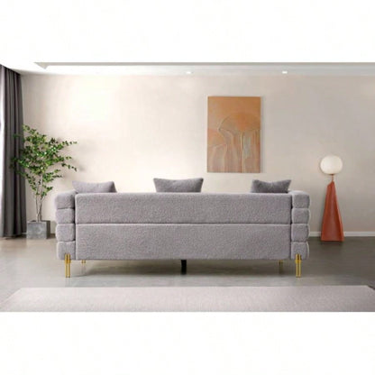 Luxurious and comfortable upholstered sofa with golden and pillows living room and reception area