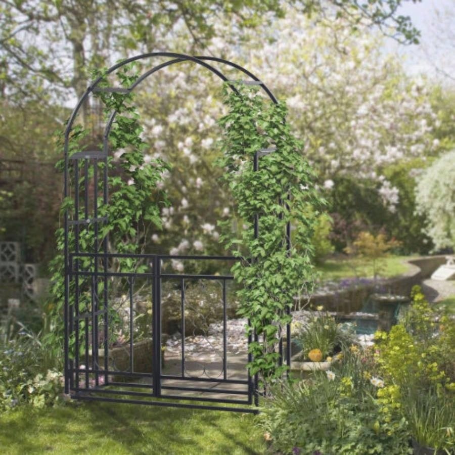 Outsunny 81 Metal Garden Arbor with Double Doors, Locking Gate, Climbing Vine Frame with Heart Motifs, Arch Wedding, Bridal Party Decoration,