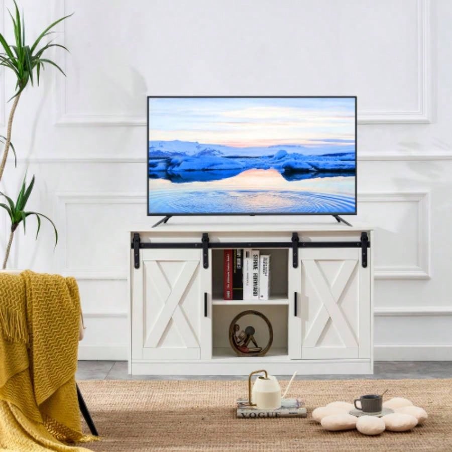 White decorative wooden TV/ storage cabinet with two sliding barn doors, available bedroom, living room, corridor.