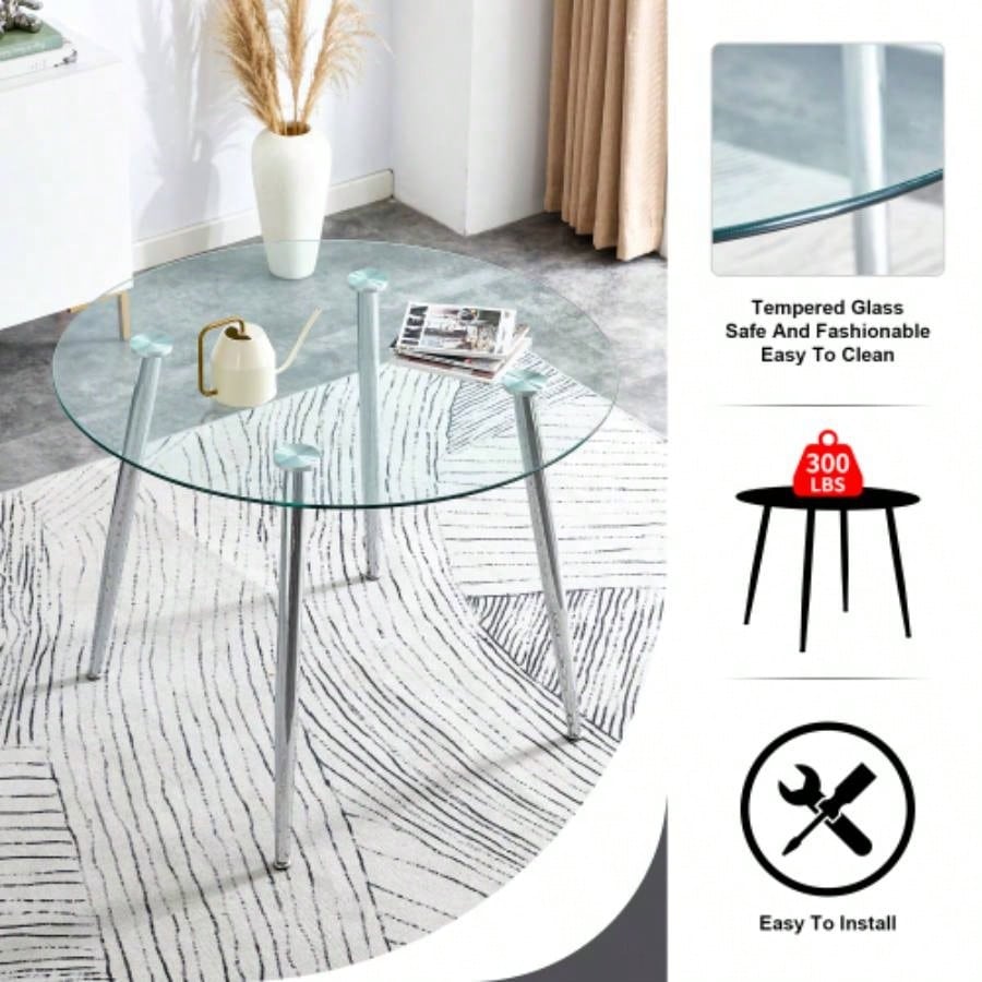 A glass tabletop with a diameter of 38.6 inches and a modern minimalist circular dining table with silver metal. Suitable living rooms, and conference rooms.