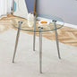 A glass tabletop with a diameter of 38.6 inches and a modern minimalist circular dining table with silver metal. Suitable living rooms, and conference rooms.