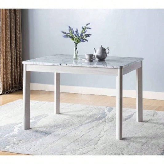 Faux marble white dining table top Four rounded leg posts Rounded table corners White Oak leg color