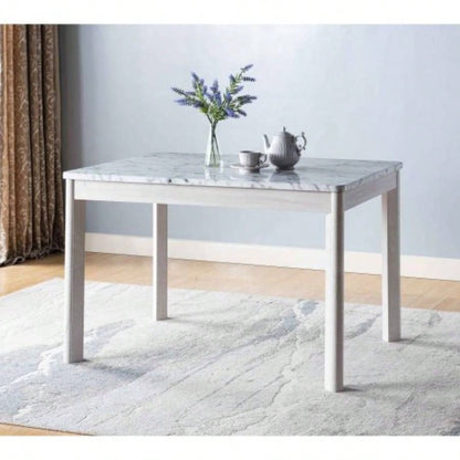 Faux marble white dining table top Four rounded leg posts Rounded table corners White Oak leg color