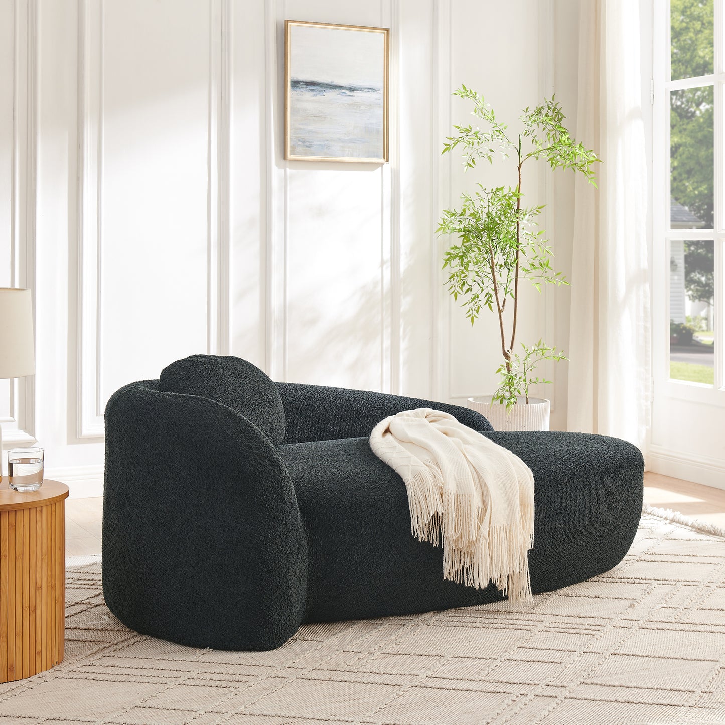 Black Foam Oval Lounge Chair with Pillow for Cozy Living Room Comfort