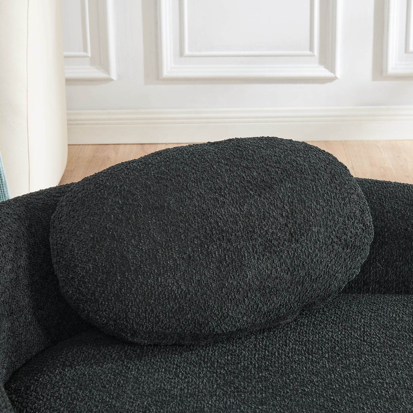 Black Foam Oval Lounge Chair with Pillow for Cozy Living Room Comfort