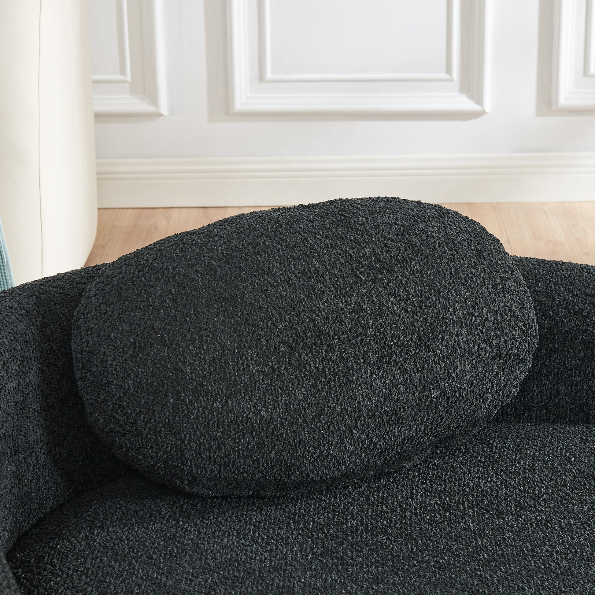 Black Foam Oval Lounge Chair with Pillow for Cozy Living Room Comfort