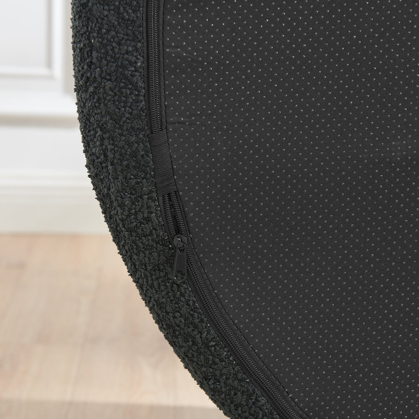 Black Foam Oval Lounge Chair with Pillow for Cozy Living Room Comfort