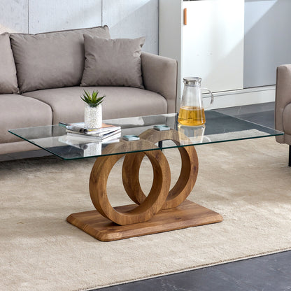 A rectangular modern and fashionable coffee table with tempered glass tabletop and wood grain table legs. Suitable for living room.47.2"*25.4"*17.9"