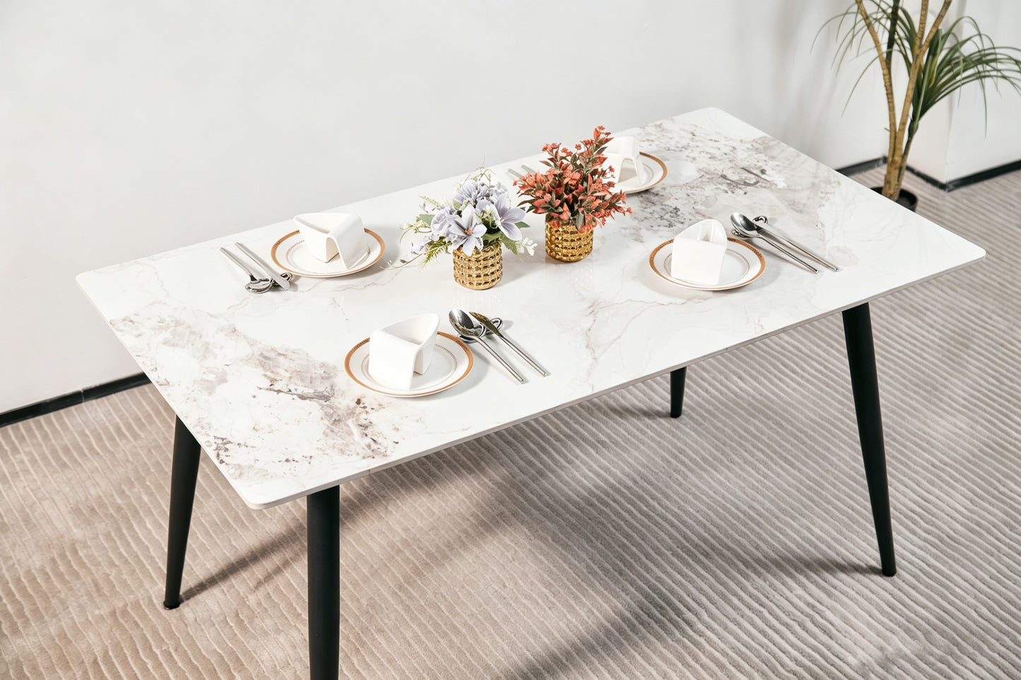 Modern Minimalist Dining Table(1.4M) with White Sintered Stone Top and Sleek Black Tapered Metal Legs for a Contemporary Kitchen or Dining Room