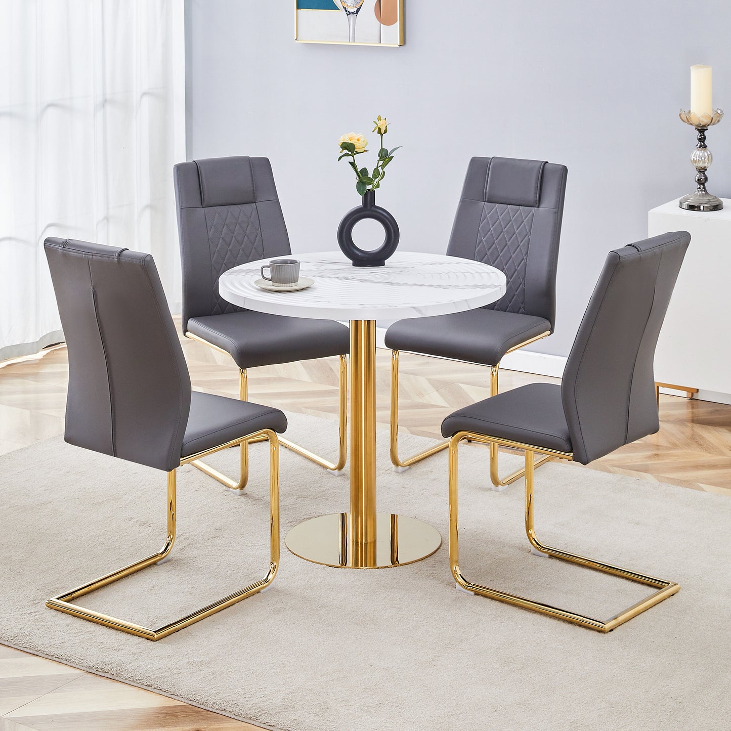 Table and chair set.31.5 Inch Elegant White Marble Pattern Round Dining Table - Suction Molding Annular Texture.Paired With 4 Gray High-quality PU Chairs With Arched Golden Metal Legs.