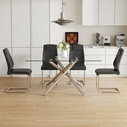 Table and chair set.Modern Luxurious Transparent Tempered Glass Dining Table Set with 4 Chairs.Single Fork Silver Metal Table Legs.Black high-quality PU dining chairs with silver metal legs.
