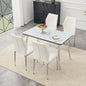 Table and chair set.White imitation marble texture glass top + lower black MDF board, silver metal tapered legs.Paired with 4 White PU Chairs with silver legs. 37 inches High: Ergonomic PU Backrest.