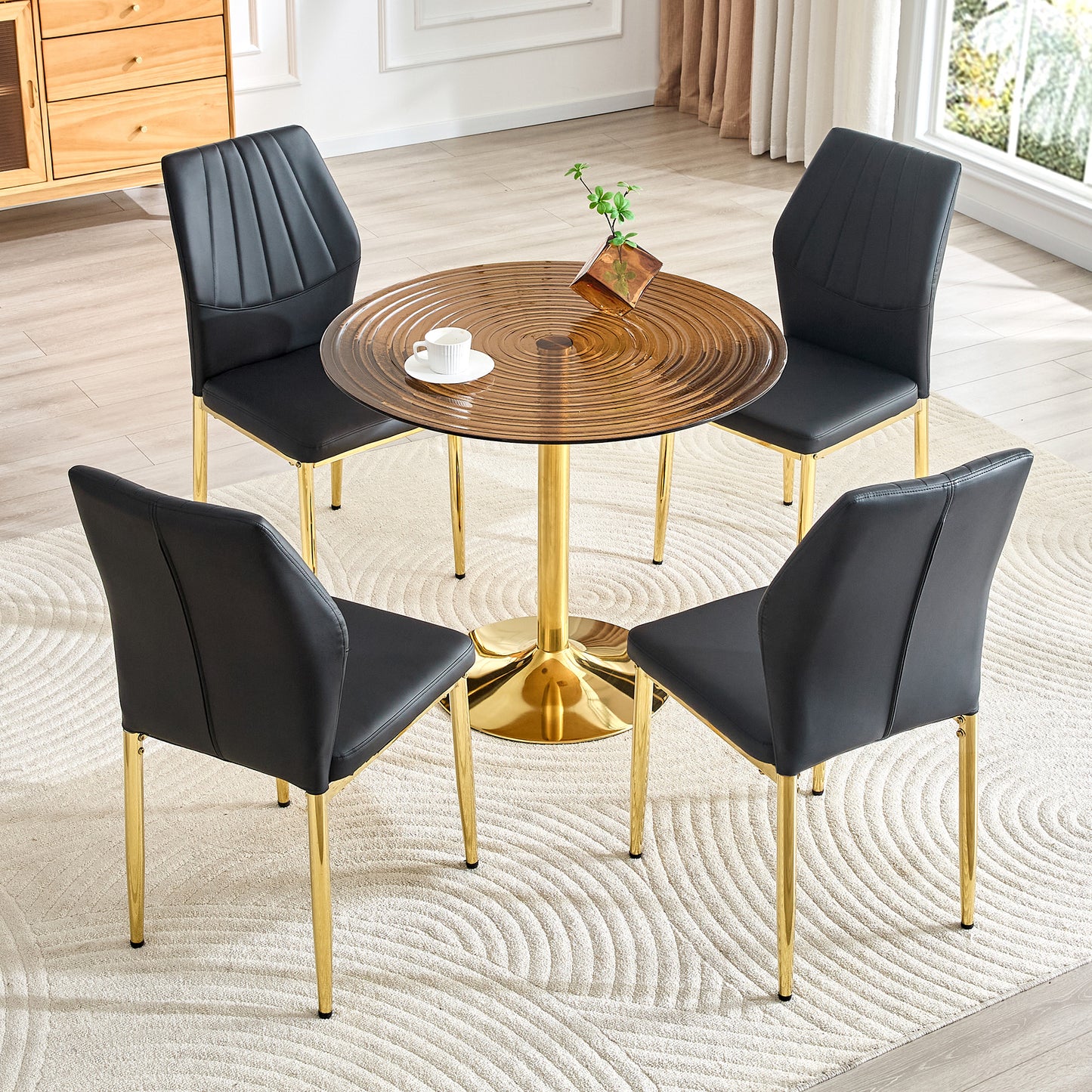 Table and chair set.35 inch diameter, light luxury brown ring glass round table.Paired with 4 Black PU Chairs with golden legs.37 inches High: Ergonomic PU Backrest with Shell - shaped.