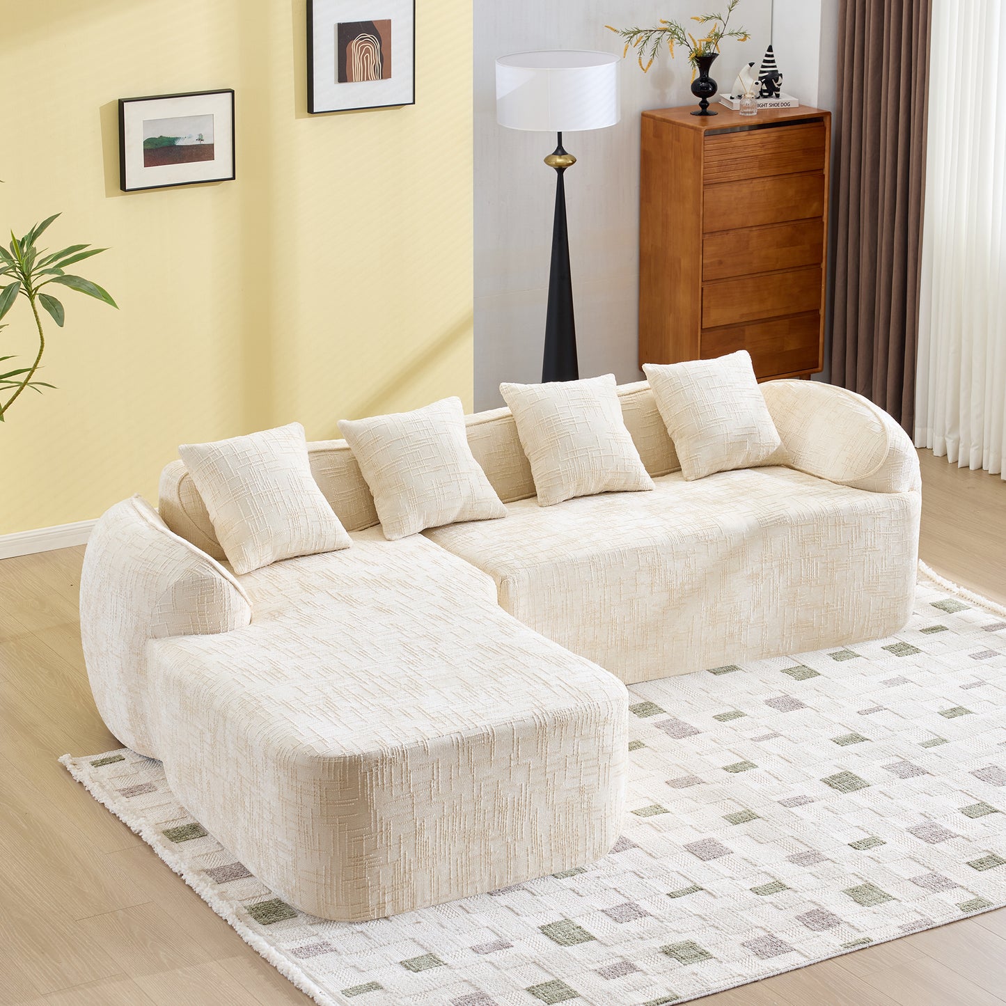 Beige chenille L-shaped compressed sofa that goes well with any living room. It features high-elastic sponge for a comfortable sitting feel,  curved armrests and four throw pillows.