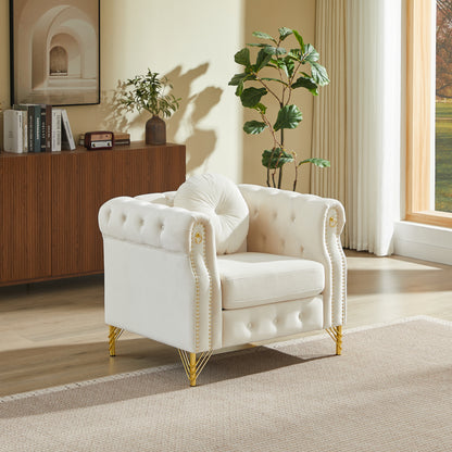 Velvet Chesterfield sofa with round pillows, featuring copper stud detailing and tufted button accents, with metal legs. Loop design allows for hanging cartoon ornaments.